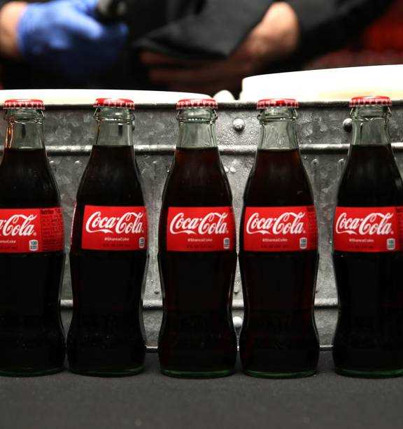 Why does Coke taste better in a glass bottle?